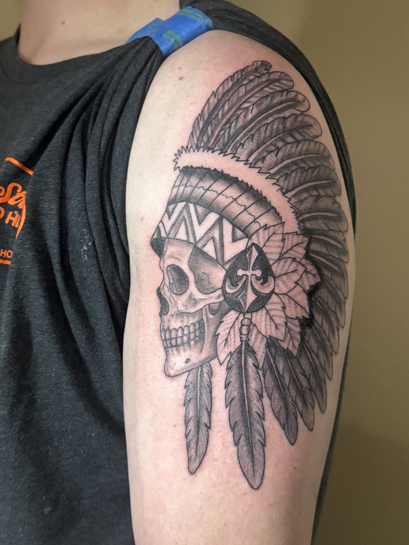 Skull with feathered headdress