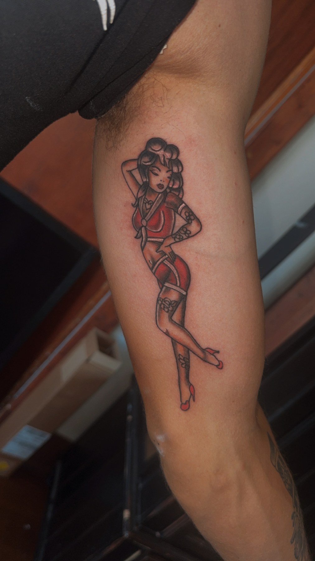 Traditional pin-up tattoo