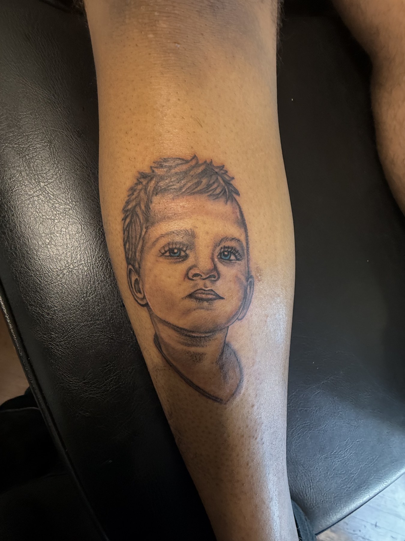 Child portrait tattoo