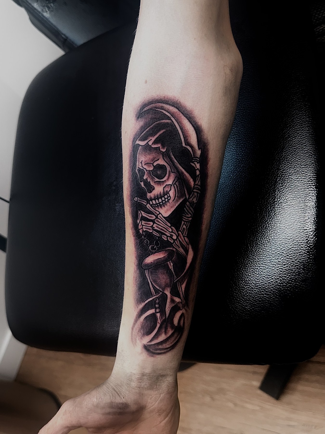 Reaper with an hourglass