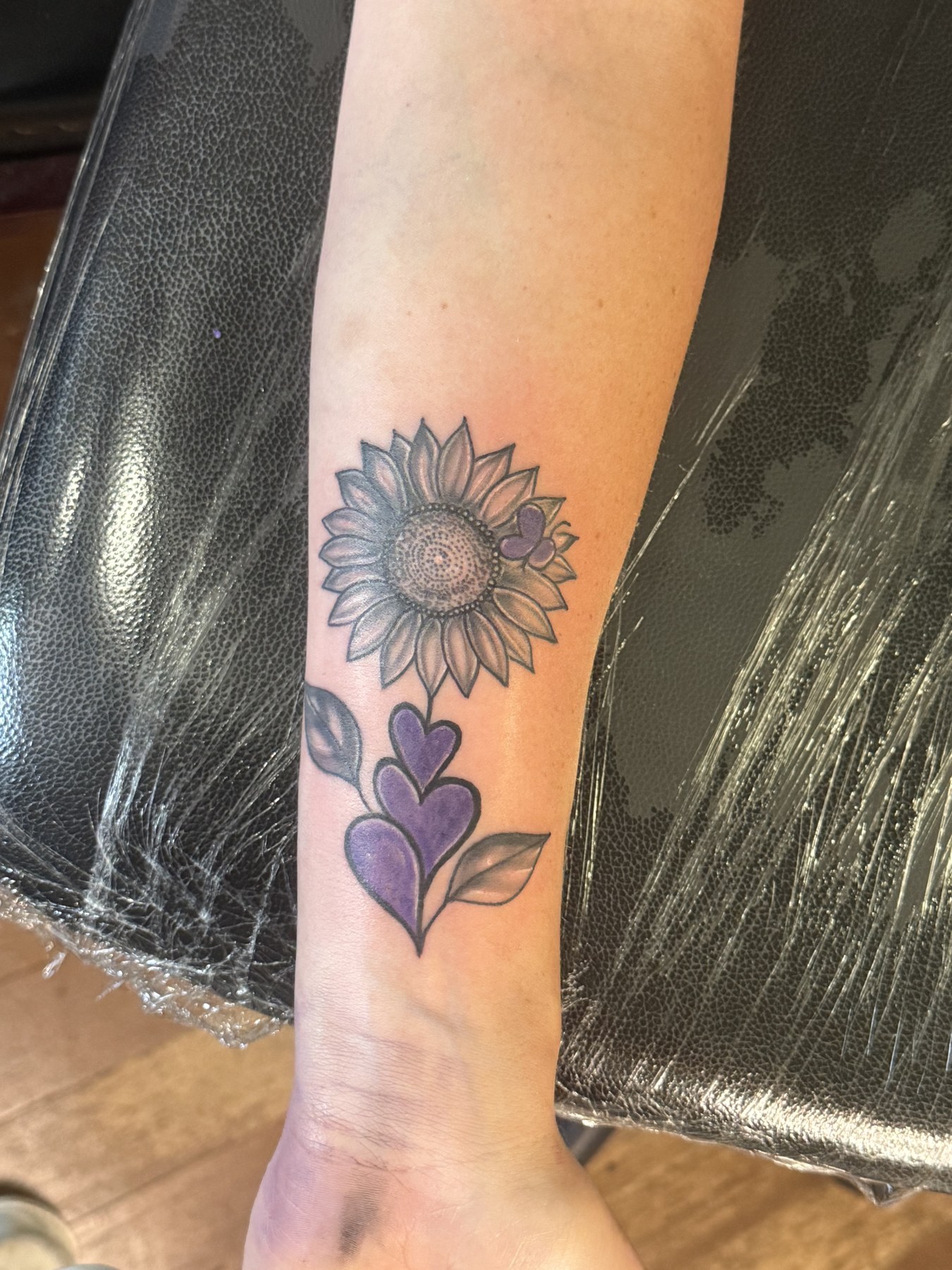 Sunflower with purple hearts